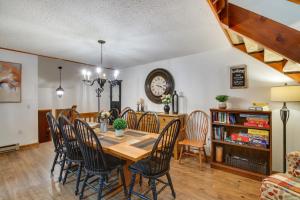 a dining room with a table and chairs at Convenient Condo Less Than 3 Mi to Slopes and Echo Lake in North Conway