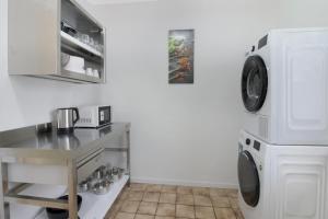 a laundry room with a washer and dryer at Apartment mit Balkon in Witten in Witten
