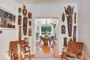 a living room filled with lots of wooden furniture at Exquisite Luxury Estate - Steps to Downtown in Toronto