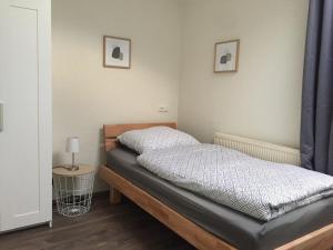 Ein Bett oder Betten in einem Zimmer der Unterkunft Fewo-Eifelfroh