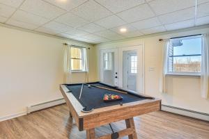 a room with a pool table in a room at Massive and Modern Coudersport Getaway on 23 Acres! in Coudersport