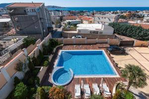 an overhead view of a swimming pool on top of a building at Villa Orpheus in Bar