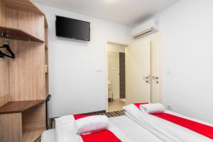 Postel nebo postele na pokoji v ubytování ParkCity rooms