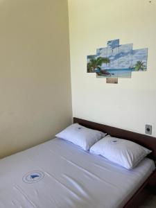 Krevet ili kreveti u jedinici u objektu Pousada Tubarão