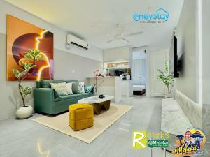 Area tempat duduk di Imperio Residence By Heystay Management