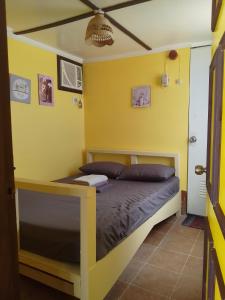 Postel nebo postele na pokoji v ubytování MLK Bamboo Beachhouse