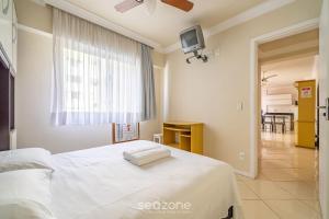 Katil atau katil-katil dalam bilik di Apto c/ 1Q 100m da Praia Central - BC - EDG403