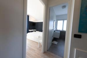 Postel nebo postele na pokoji v ubytování Casa Vecchia Quercia