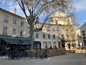 a building with bikes parked in front of it at Junior suite avec balcon in Lyon