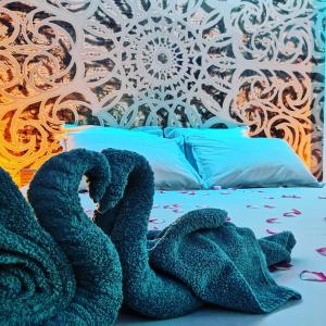 Ένα ή περισσότερα κρεβάτια σε δωμάτιο στο Cocon d'Evasion**** SPA PRIVATIF et ciels étoilés
