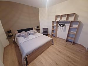 Postel nebo postele na pokoji v ubytování ROUSSEAU LOISON