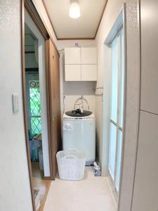 Ванная комната в Itsukaichi First Villa Hiroshima - Vacation STAY 15653