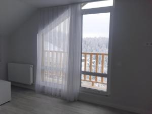 Rõdu või terrass majutusasutuses Sofi