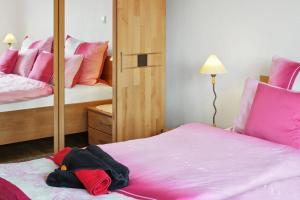 Postel nebo postele na pokoji v ubytování Ferienhaus in Roggendorf Haus - Fernblick + 14 fotografií