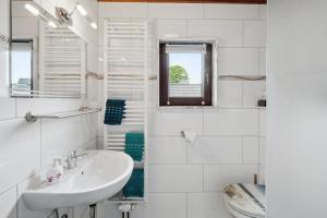 Koupelna v ubytování Ferienhaus in Roggendorf Haus - Fernblick