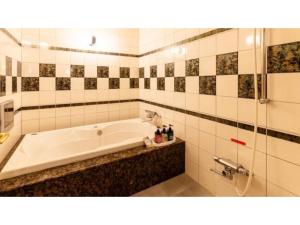Ванная комната в SHIZUKUISHI RESORT HOTEL - Vacation STAY 29557v