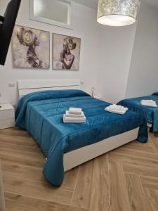 Postel nebo postele na pokoji v ubytování Casa Gaia