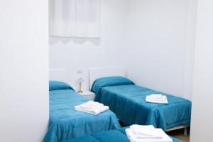 Postel nebo postele na pokoji v ubytování Casa Gaia