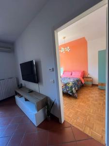 AnyHome Oasi in città客房内的一张或多张床位