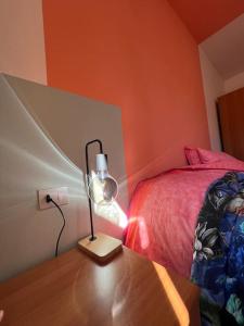 AnyHome Oasi in città客房内的一张或多张床位