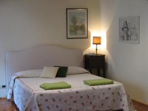 Postel nebo postele na pokoji v ubytování B&B A Casa Di Andrea