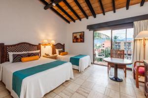 Postel nebo postele na pokoji v ubytování Hacienda Buenaventura Hotel & Mexican Charm - All Inclusive
