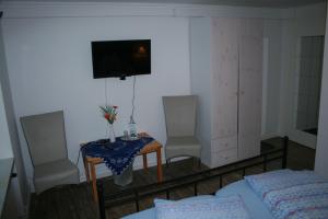 Postel nebo postele na pokoji v ubytování Pension Haus Butz