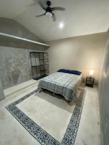 Ένα ή περισσότερα κρεβάτια σε δωμάτιο στο Casa Costa Rosa - Habitación Mar