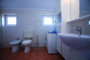 Kúpeľňa v ubytovaní Apartments Villa Oliva