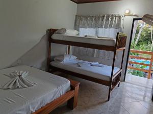 Postel nebo postele na pokoji v ubytování Finca Campestre La Flor