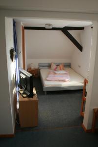 Postel nebo postele na pokoji v ubytování Pension Haus Butz
