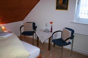 Postel nebo postele na pokoji v ubytování Pension Haus Butz