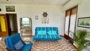 Гостиная зона в Cuore di Ognina - Appartamenti vista mare