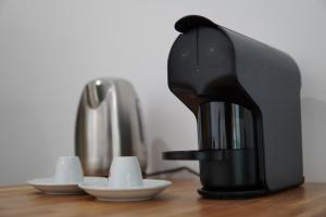 Kemudahan buat kopi dan teh di Geams Sal Suite