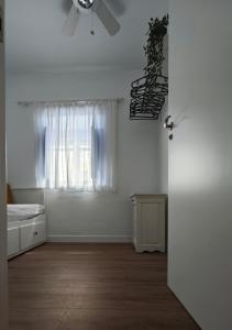 Łóżko lub łóżka w pokoju w obiekcie La Salamandra Azul