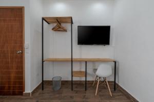 TV a/nebo společenská místnost v ubytování Casa Fersan