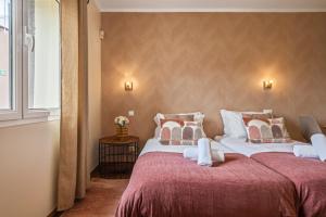 Postel nebo postele na pokoji v ubytování Casas do Salao by Homie