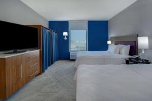 Postel nebo postele na pokoji v ubytování Home2 Suites Dallas-Frisco