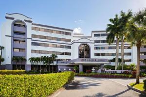 a rendering of the front of a hotel at DoubleTree by Hilton Hotel West Palm Beach Airport in West Palm Beach