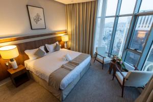 Voodi või voodid majutusasutuse Wassad Hotel Makkah فندق وسد مكة toas