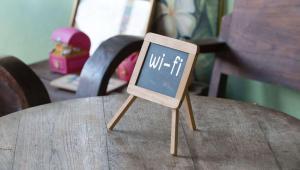 a sign sitting on top of a table at Xecutive Inn and Suites in Center