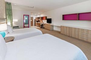 Postel nebo postele na pokoji v ubytování Home2 Suites By Hilton Weatherford