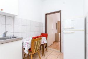 Kuchyň nebo kuchyňský kout v ubytování Apartments by the sea Podaca, Makarska - 2783