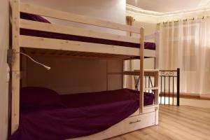 Ένα ή περισσότερα κρεβάτια σε δωμάτιο στο Loft Deluxe du Moulin Vert