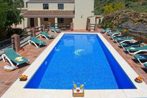 Gallery image of Villa Los Poyatos, beheizter Pool, Wifi, AC,BBQ in Comares +14 photos