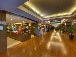 Ο χώρος του λόμπι ή της ρεσεψιόν στο Flat no S4 Hotel em Águas Claras +12 φωτογραφίες