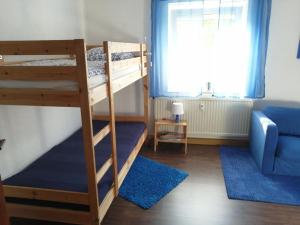 Двох'ярусне ліжко або двоярусні ліжка в номері FERIENWOHNUNG nahe Günzburg und Legoland