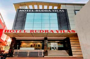 a hotel rudra villas sign in front of a building at Hotel Rudra Vilas in Agra