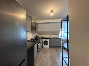 מטבח או מטבחון ב-Wembley Stadium Serviced Apartments, 12mins to Central London