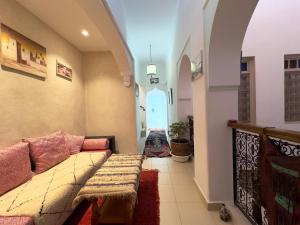 Area soggiorno di Riad La Rose Des Sables